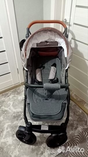 Прогулочная всесезонная коляска camarelo elix