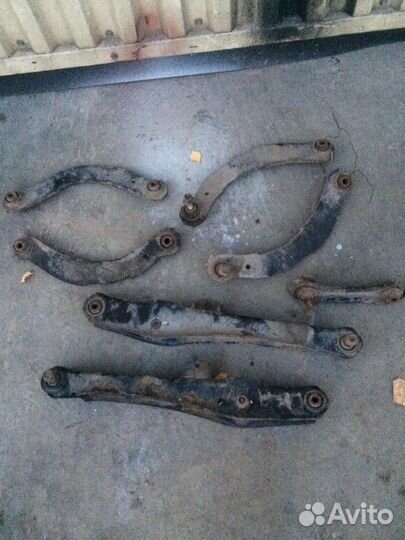 Задний рычаг подвески на Mitsubishi Lancer 9 10