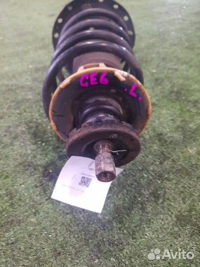 Амортизатор подвески передний левый Honda Fit