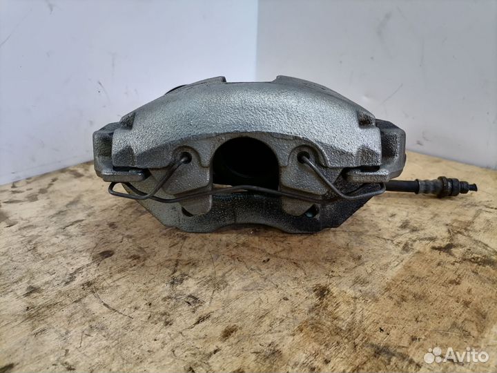 Передний тормозной суппорт Мазда 3 BK BL