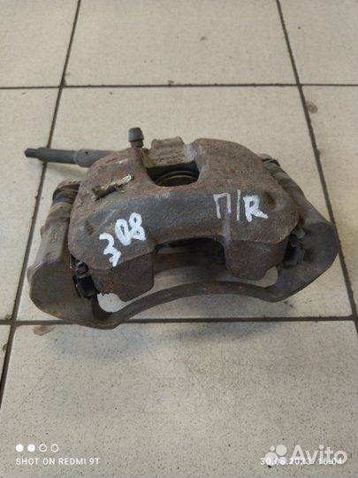 Суппорт тормозной передний правый Peugeot 308