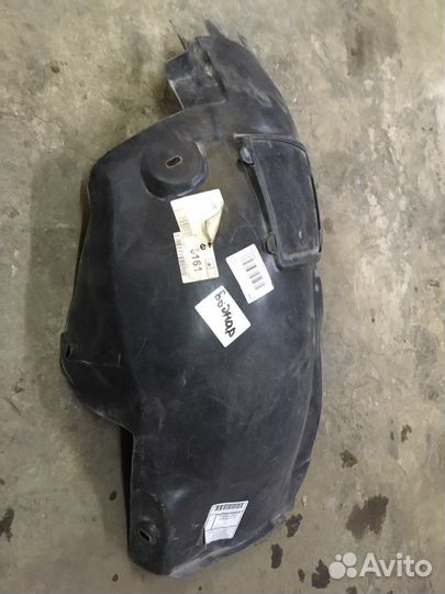 Подкрылок передний левый Opel Astra H