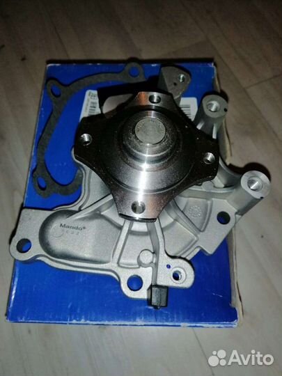 Насос водяной Mazda 626/323 с 92 года