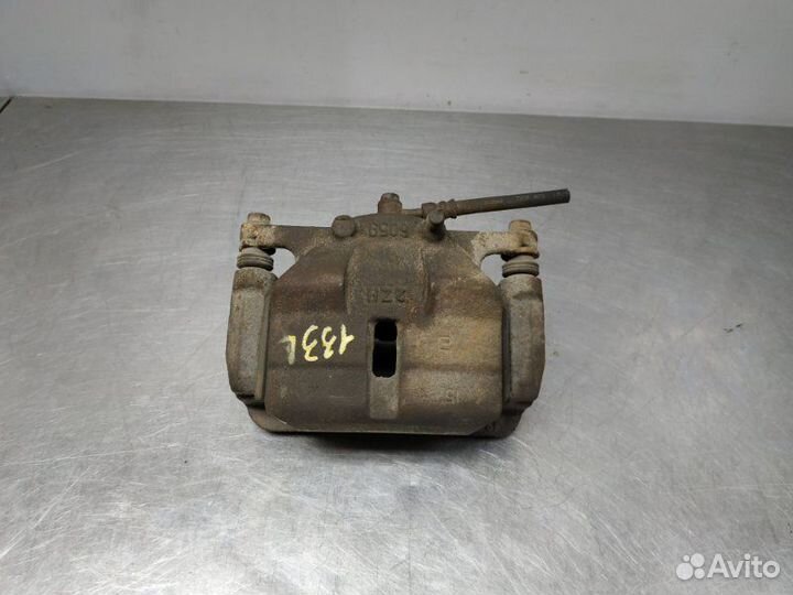 Суппорт передний левый Nissan X-Trail T31 MR20DE