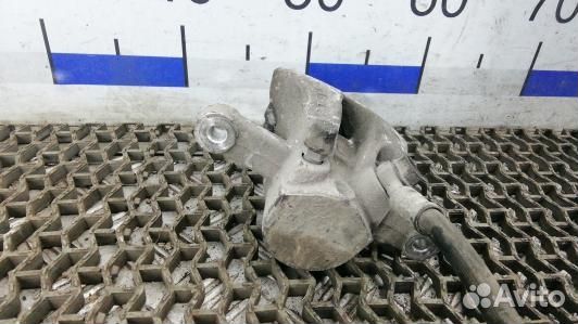 Суппорт тормозной задний левый toyota avensis T25