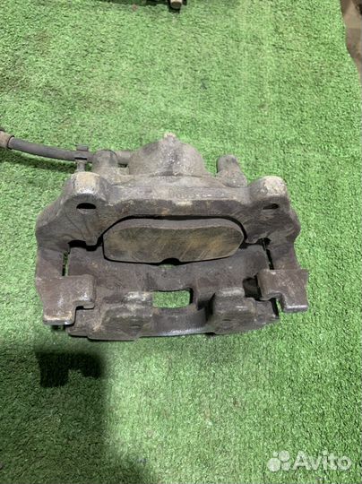 Передний левый тормозной суппорт Opel Vectra C