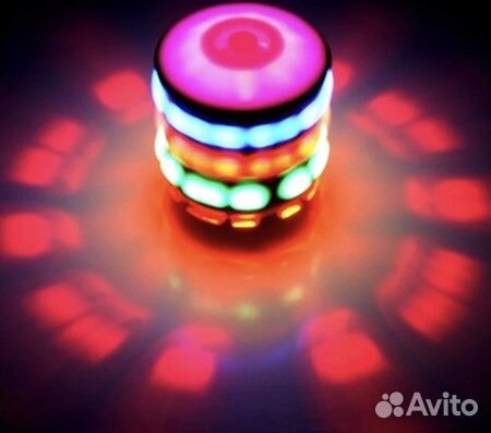 Заводная светящаяся и музыкальная юла