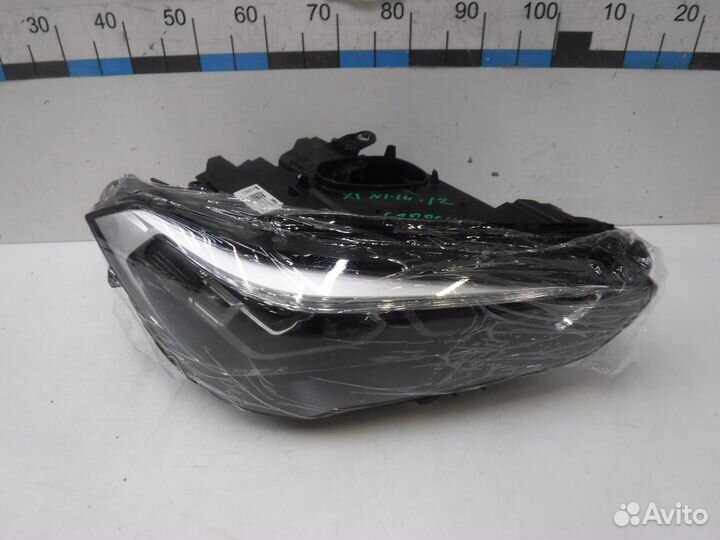 Фара правая BMW X1