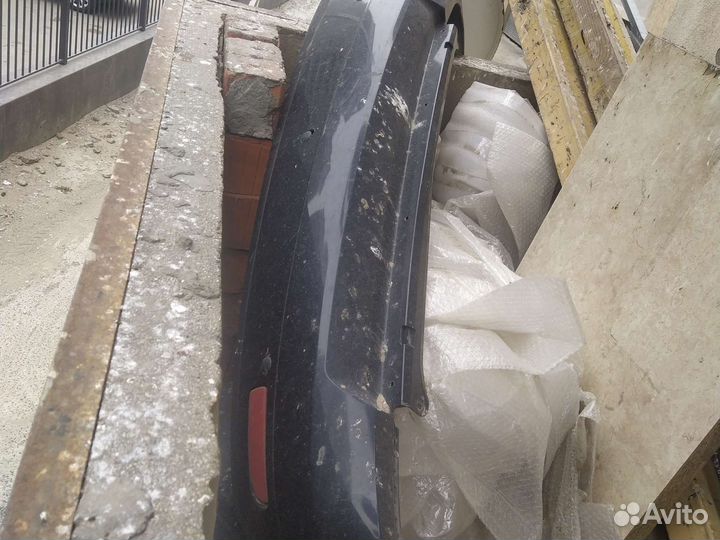 Задний бампер на priora