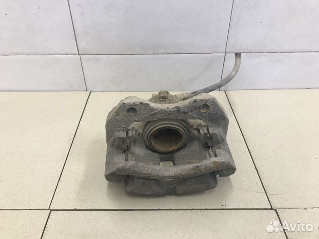 Суппорт передний правый Primera P12E 2002-2007