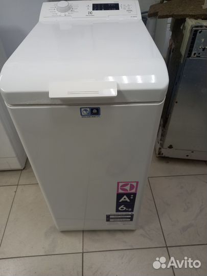 Стиральная машина с вертикальной загрузкой