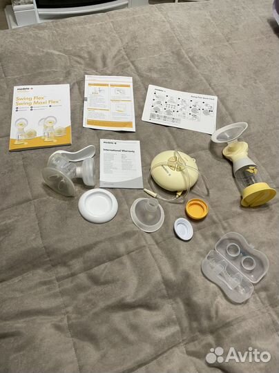 Молокоотсос medela электрический