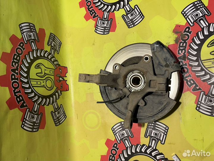 Кулак поворотный левый в сборе Nissan Almera G15