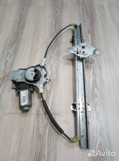 Стеклоподъемник перед Nissan note E11 Прав