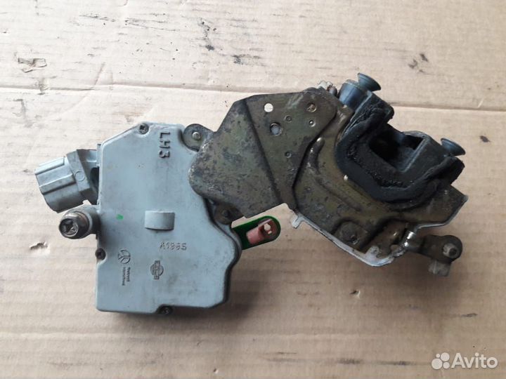 Замок двери передней левой Ниссан Альмера Н16