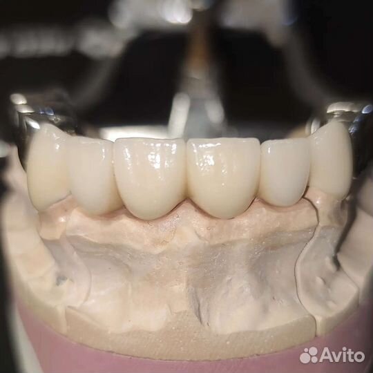 Зубной техник