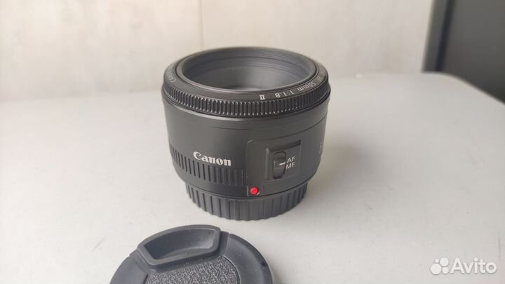 Canon EF 50mm f/1.8 II с пылинкой