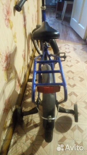 Продам детский велосипед с боковыми дополнительным