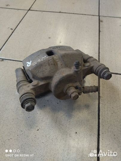 Суппорт тормозной передний правый Kia Picanto 1