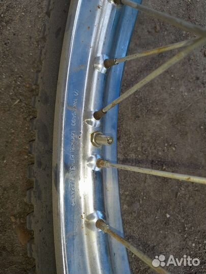 Продам переднее колесо(стальной обод) на 21(japan)