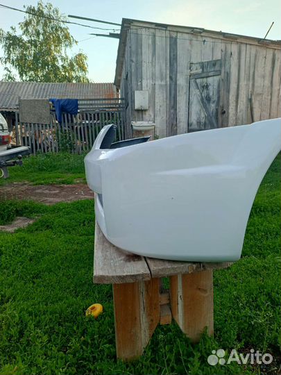 Передний бампер mazda 323