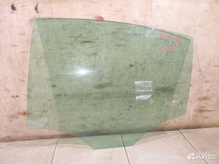 Стекло двери задней левой VW Passat (B7)
