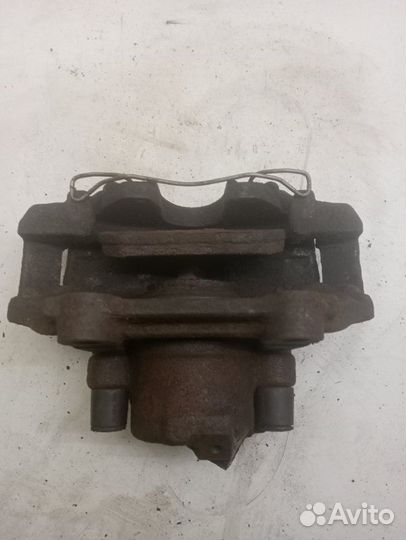 Суппорт тормозной передний правый Volkswagen