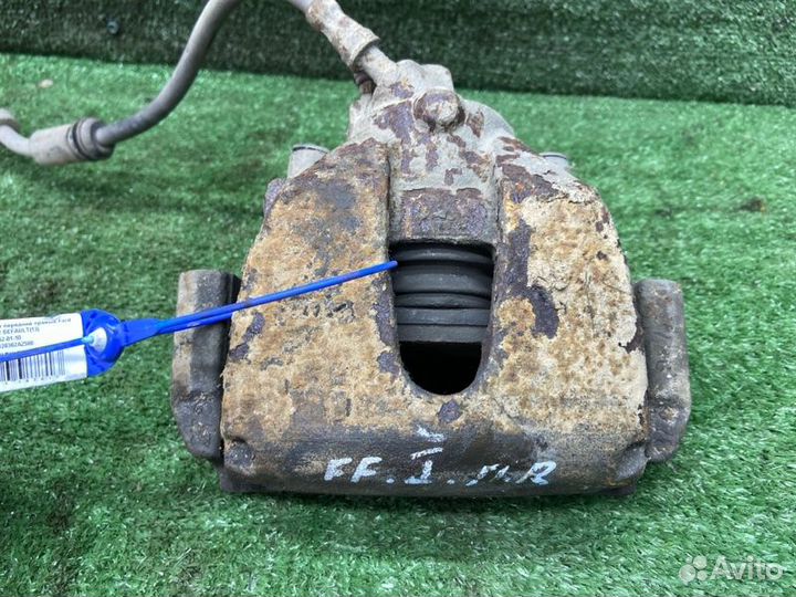 Тормозной суппорт передний правый Ford Focus 2