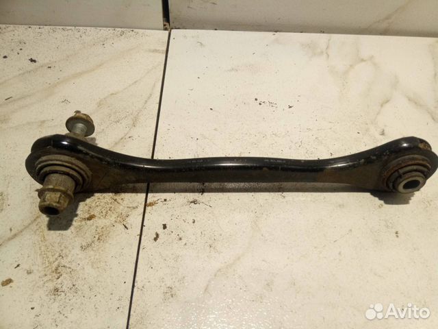 Реактивная тяга задней подвески левая Skoda