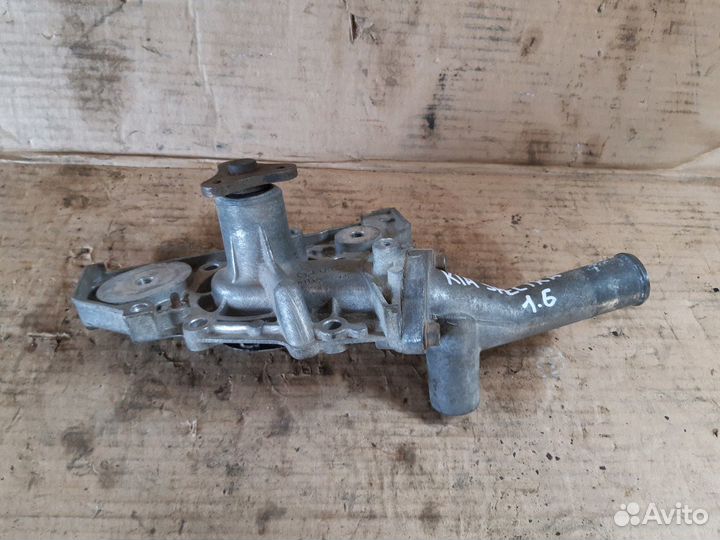 Помпа водяная Киа Спектр 1.6