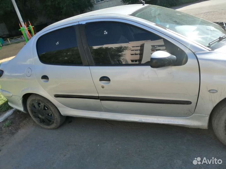 Двери на peugeot 206 седан