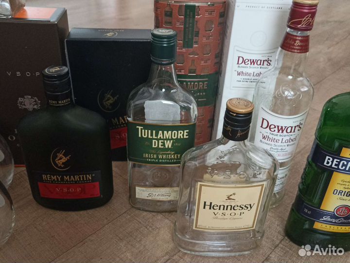 Бутылки с коробками от элитного алкоголя