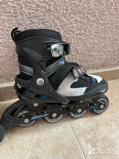 Роликовые коньки