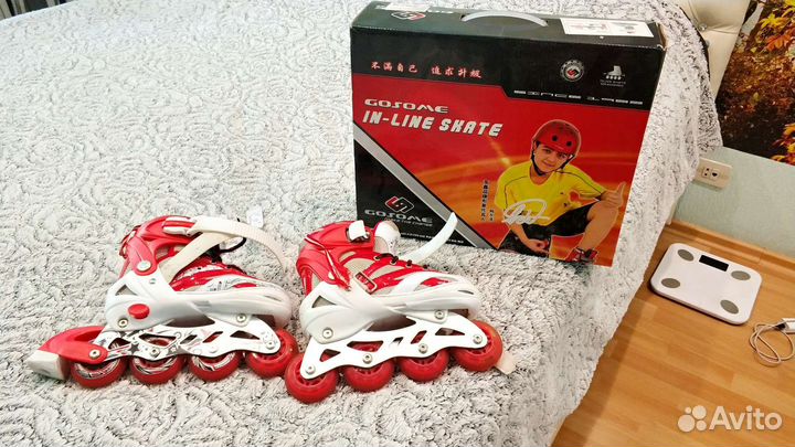 Роликовые коньки