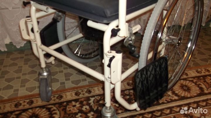 Инвалидная коляска