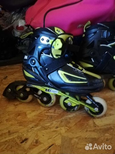 Роликовые коньки