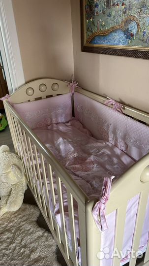 Детская кроватка с поперечным маятником