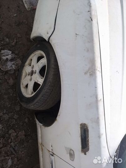 Крыло левое део магнус,шевролет эванда