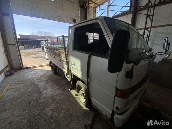 Isuzu Elf, 1990