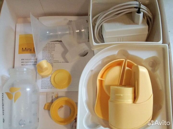 Молокоотсос medela электрический
