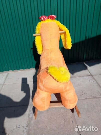 Собака качалка