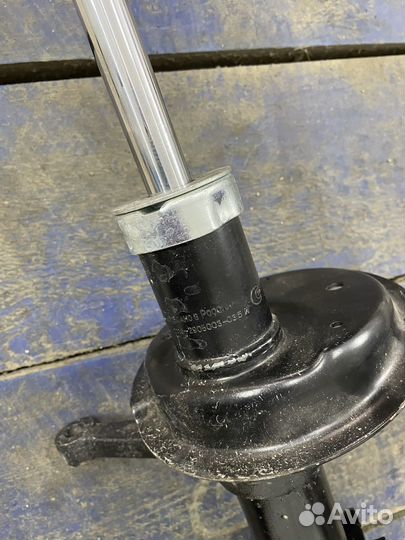 Стойка амортизатора передняя левая калина