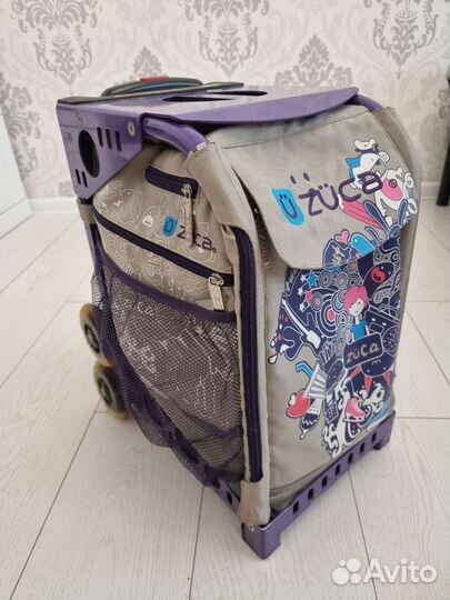 Фигурная сумка на колёсах