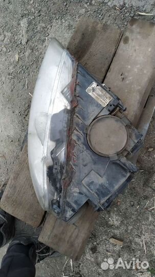 Фара передняя левая Volkswagen Touareg