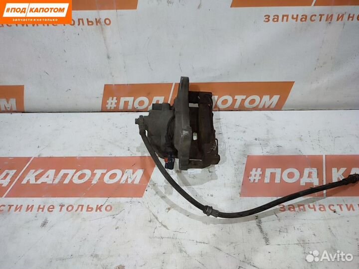 Суппорт тормозной передний левый Volkswagen Tiguan