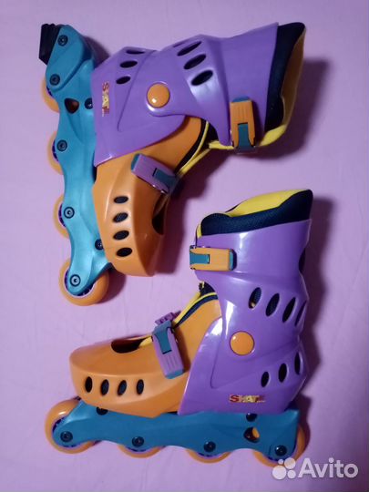 Роликовые коньки