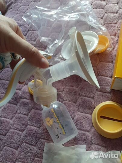Молокоотсос ручной medela