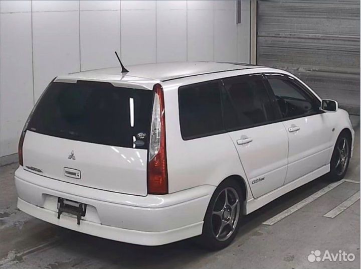 Шторка багажника Mitsubishi Lancer Cedia CS5W