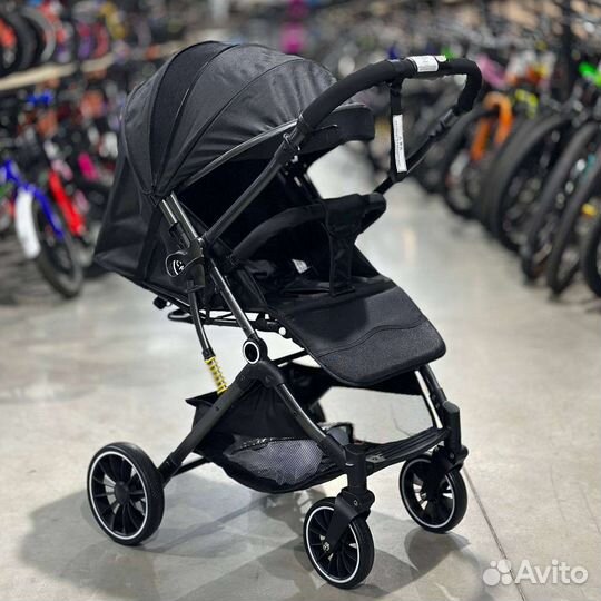Прогулочная коляска с перекидной ручкой новая