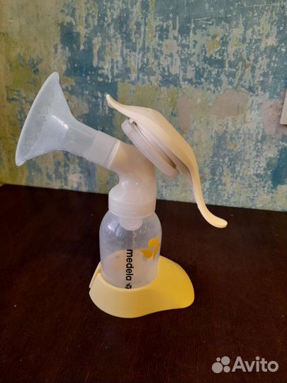 Молокоотсос medela ручной